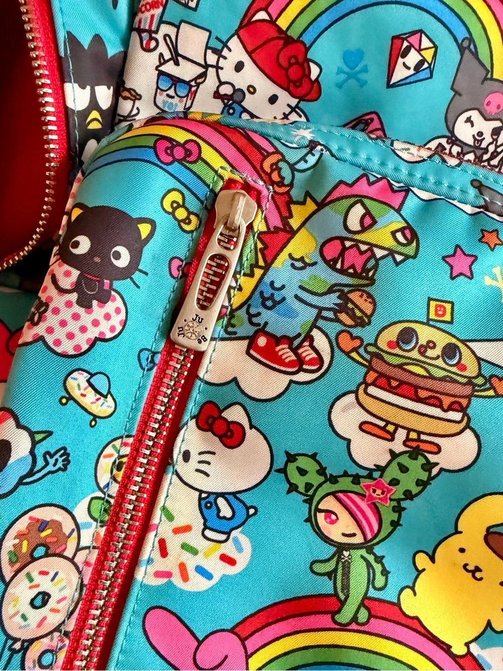 tokidoki x Hello Sanrio for JujuBe Baby Backpack - Bright Blue Rainbow Print